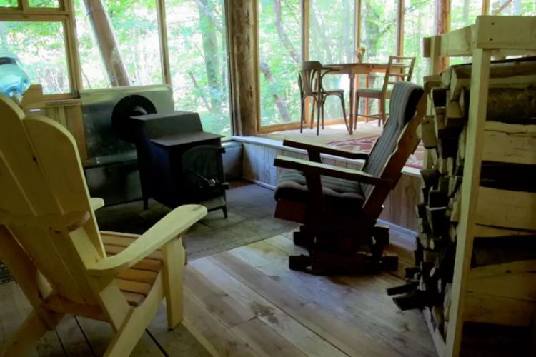 0200 Enjoy this woodland cabins fantastic views then turn toward its gorgeous interior design smallhometours.com 5