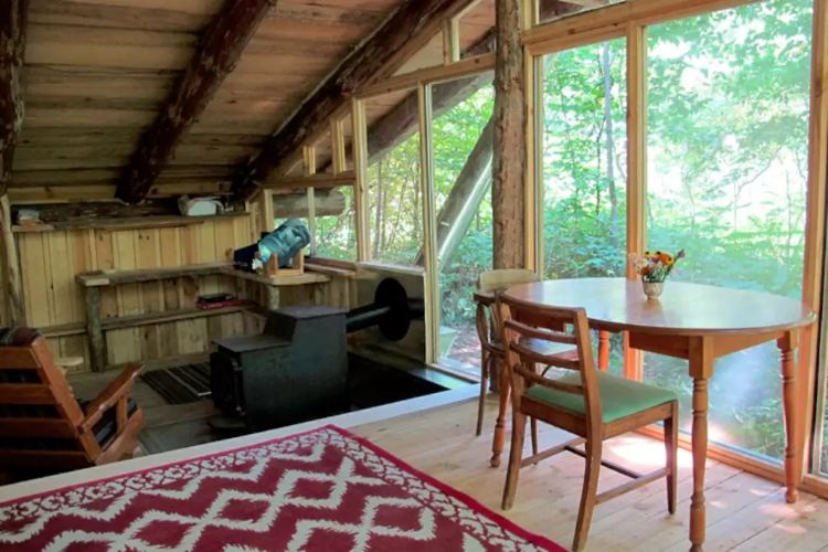 0200 Enjoy this woodland cabins fantastic views then turn toward its gorgeous interior design smallhometours.com 6