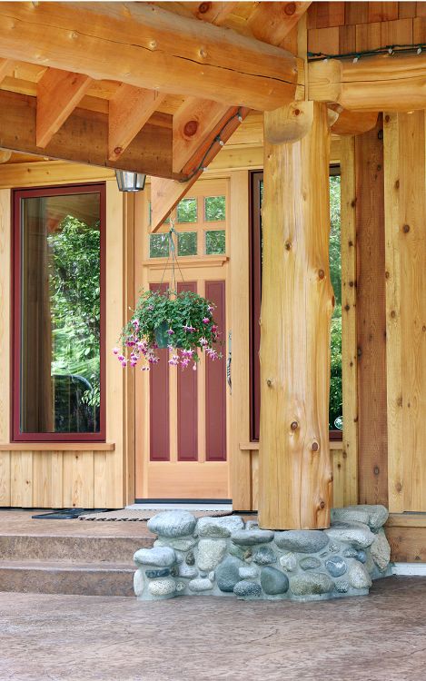 0202 Log homes entryway is gorgeous but the inside will excite any rustic home enthusiast smallhometours.com 2