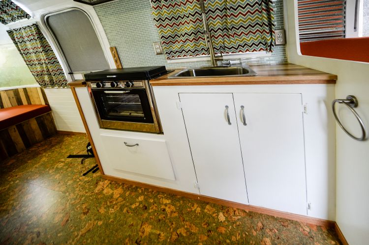 0205 70s style meets modern convenience in this remodeled Airstream Overlander smallhometours.com 4