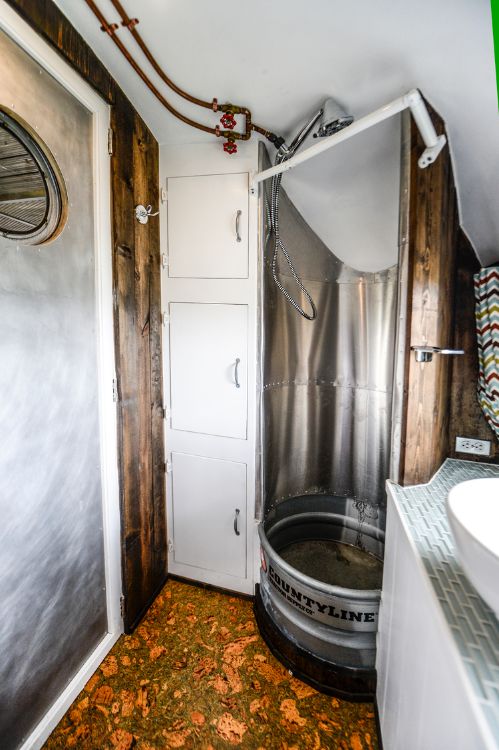 0205 70s style meets modern convenience in this remodeled Airstream Overlander smallhometours.com 6