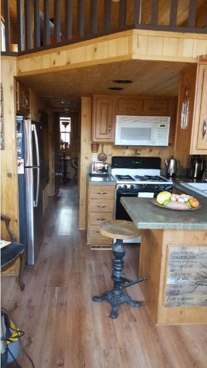 0211 You cant miss the striking interior decor in this park model smallhometours.com 4
