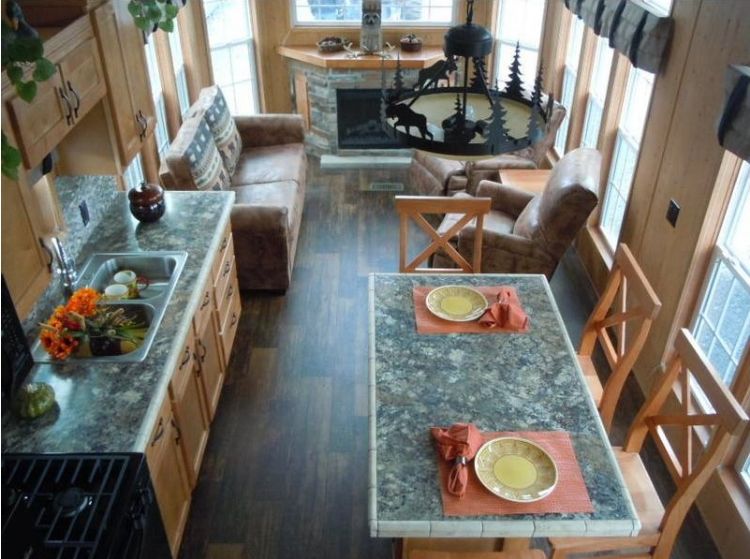 0214 Become enchanted with the rich rustic tones of this park models interior smallhometours.com 10