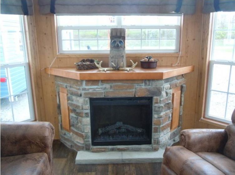 0214 Become enchanted with the rich rustic tones of this park models interior smallhometours.com 3