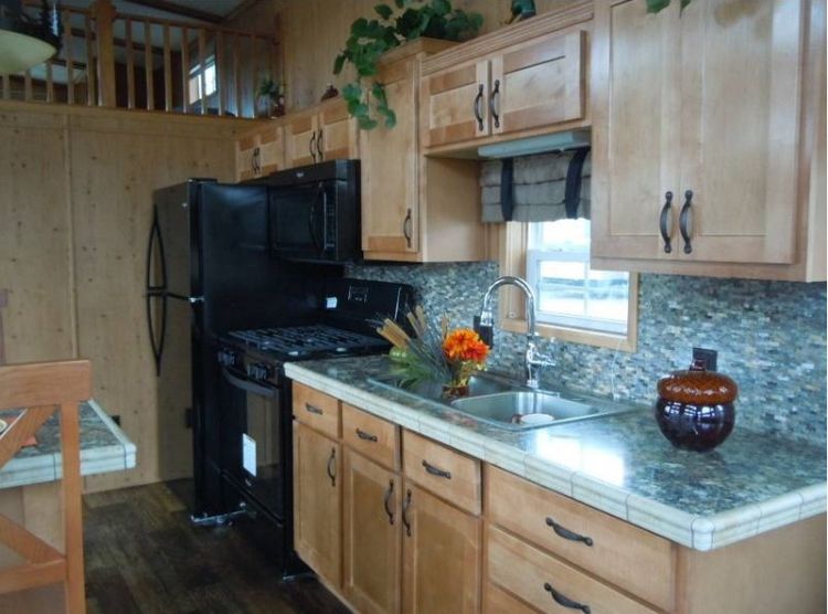 0214 Become enchanted with the rich rustic tones of this park models interior smallhometours.com 5
