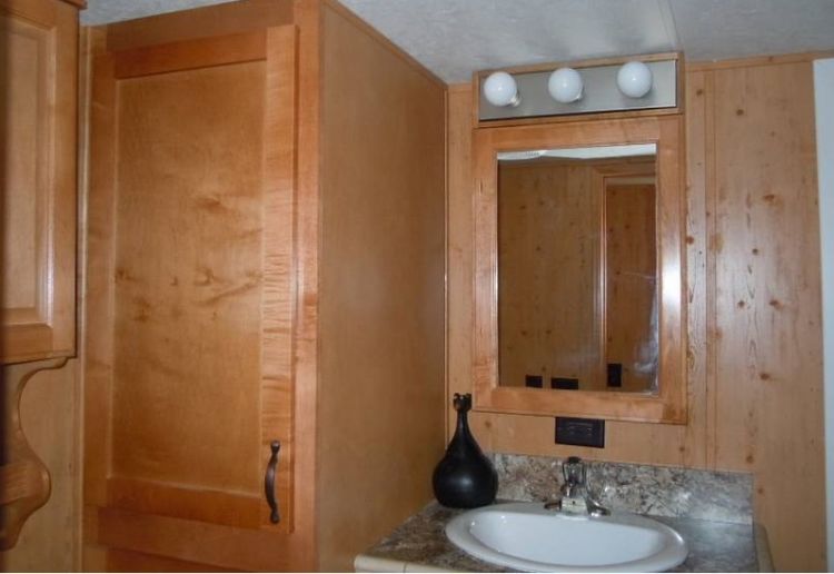 0214 Become enchanted with the rich rustic tones of this park models interior smallhometours.com 6