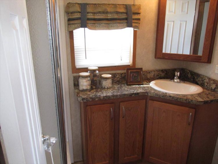 0218 Live in perfect Harmony with this brand new Fairmont model — the interior is a beauty smallhometours.com 5