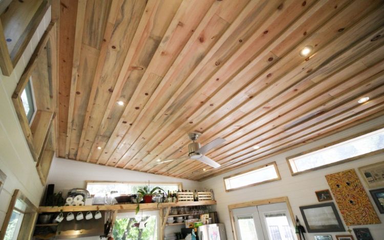 0222 Marvel at the gorgeous ceilings and ultra functional kitchen in this luxurious park model smallhometours.com 4