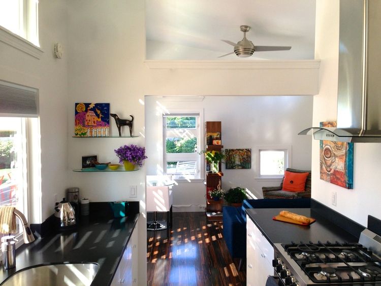 0225 Take a peek at a top of the line model with a kitchen thats as sleek as they get smallhometours.com 6