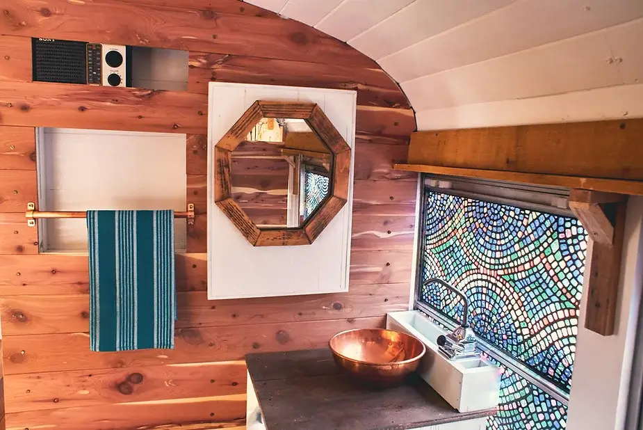 0229 Bus conversion tiny house tour off grid solar school bus smallhometours.com 2