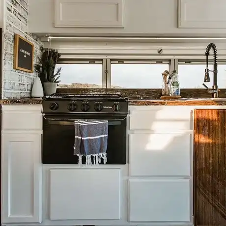 0236 Beautiful DIY school bus conversion with clever design hacks smallhometours.com 6
