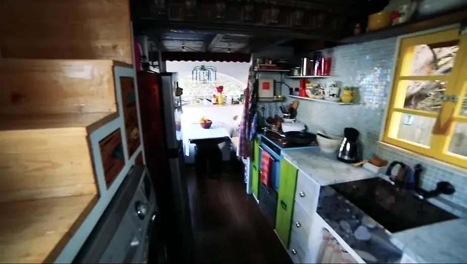 0250 European style tiny house with pizza oven outside shower smallhometours.com 6