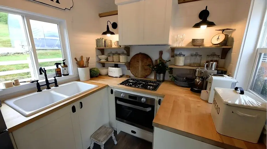 0251 Fabulous farmhouse style tiny home smallhometours.com 1