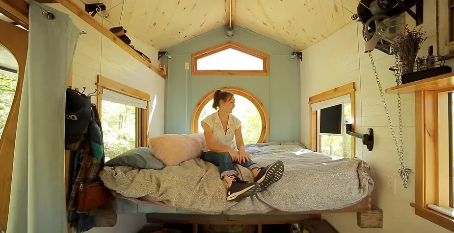 0253 Tiny house with reclaimed materials bathroom penny floor smallhometours.com 6