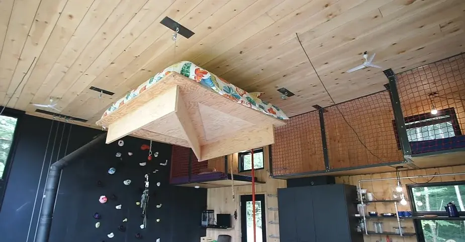 0260 Tiny house with energy wheel floating bed indoor climbing wall smallhometours.com 3