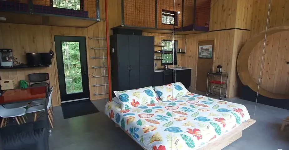 0260 Tiny house with energy wheel floating bed indoor climbing wall smallhometours.com 6