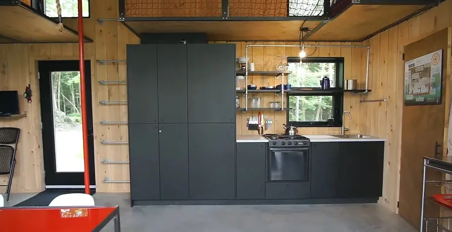 0260 Tiny house with energy wheel floating bed indoor climbing wall smallhometours.com 7