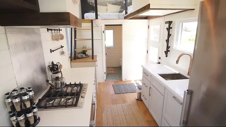 0282 24 ft tiny house on wheels with a rooftop XL kitchen smallhometours.com 3