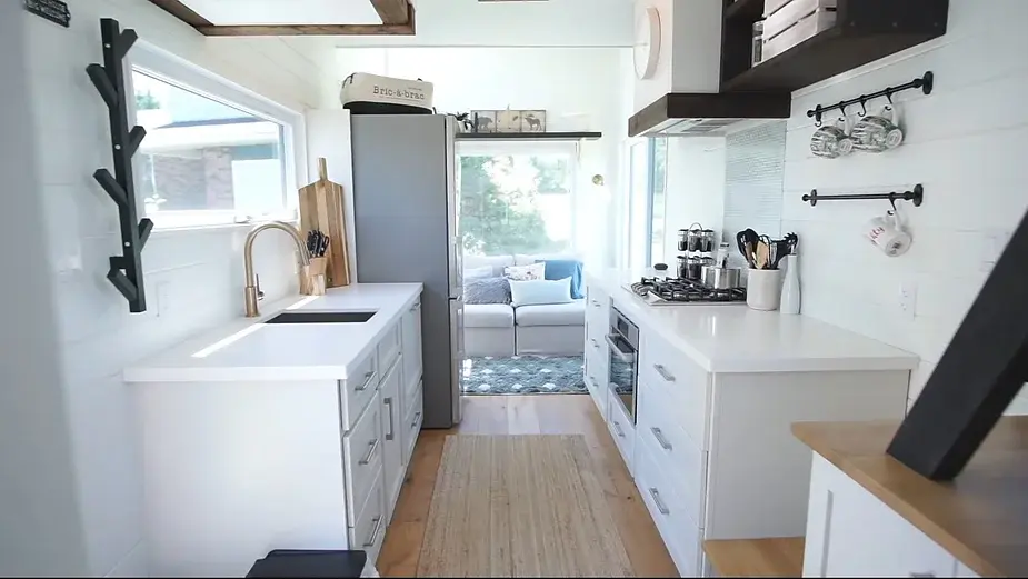 0282 24 ft tiny house on wheels with a rooftop XL kitchen smallhometours.com 5