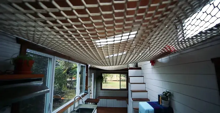 0294 Amazing DIY tiny house 24 ft with loft hammock smallhometours.com 10