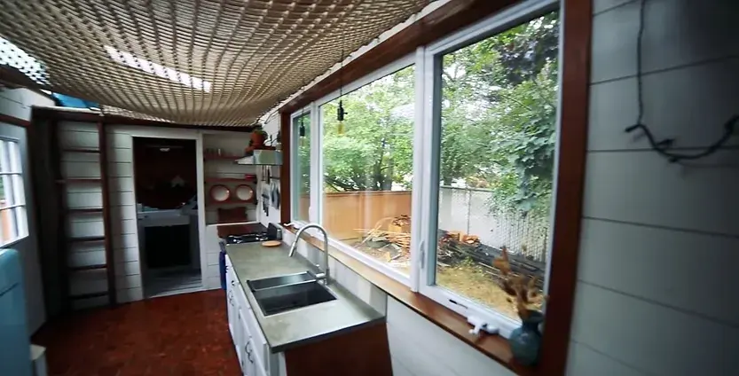 0294 Amazing DIY tiny house 24 ft with loft hammock smallhometours.com 11