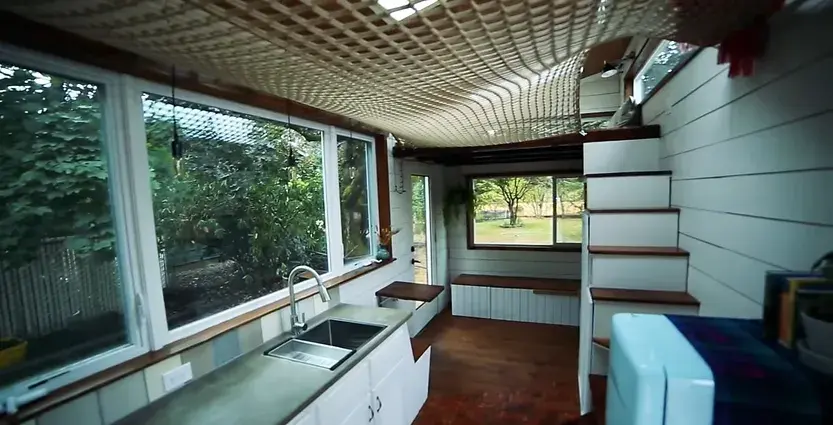 0294 Amazing DIY tiny house 24 ft with loft hammock smallhometours.com 6