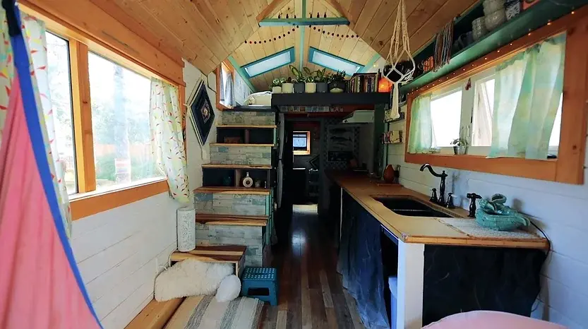 0297 3 bedroom tiny house with huge greenhouse smallhometours.com 1