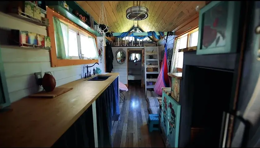 0297 3 bedroom tiny house with huge greenhouse smallhometours.com 8