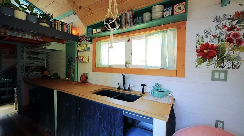 0297 3 bedroom tiny house with huge greenhouse smallhometours.com 9