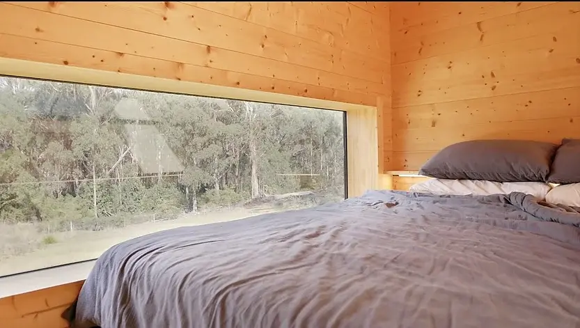 0301 Modern 28m off grid tiny house build in forest with outside bath smallhometours.com 1