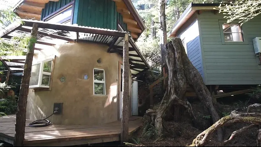 0309 A fantastic DIY cobb tiny house built with earth reclaimed materials smallhometours.com 1