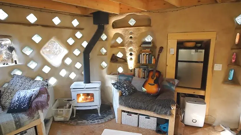0309 A fantastic DIY cobb tiny house built with earth reclaimed materials smallhometours.com 2