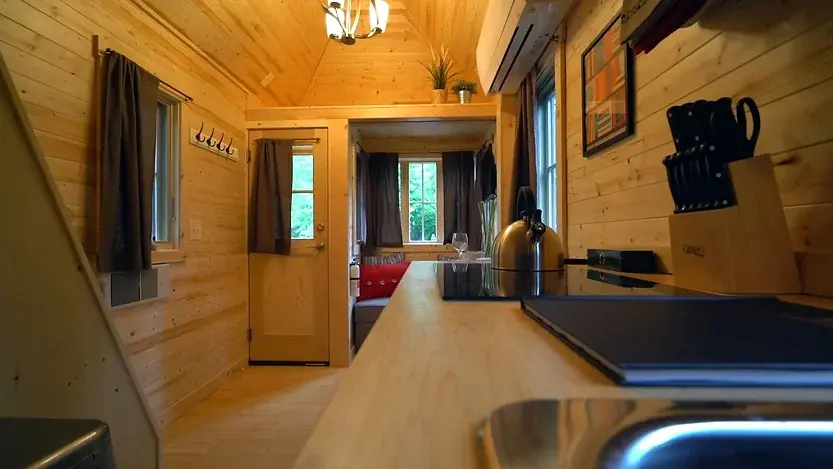 0317 26 foot triple axel trailer tiny house with downstairs bedroom smallhometours.com 3