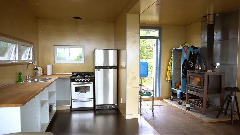 0319 Stunning off grid shipping container tiny home on mountain smallhometours.com 5