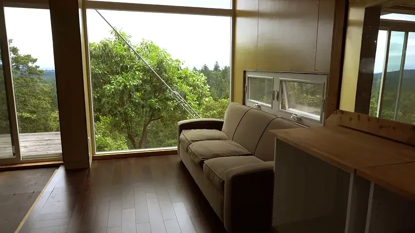0319 Stunning off grid shipping container tiny home on mountain smallhometours.com 6