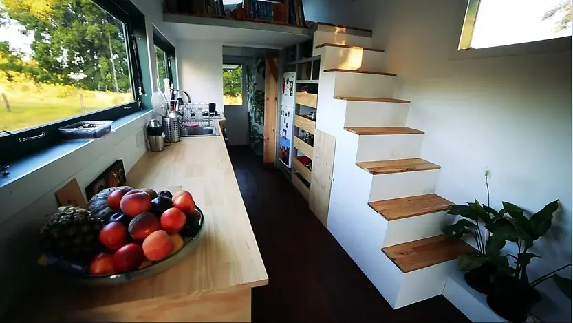 0321 Amazing tiny house with solar hot water solar electricity biogas and rainwater collection smallhometours.com 6
