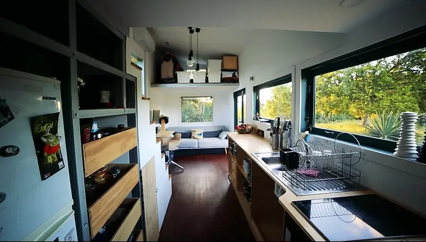 0321 Amazing tiny house with solar hot water solar electricity biogas and rainwater collection smallhometours.com 7