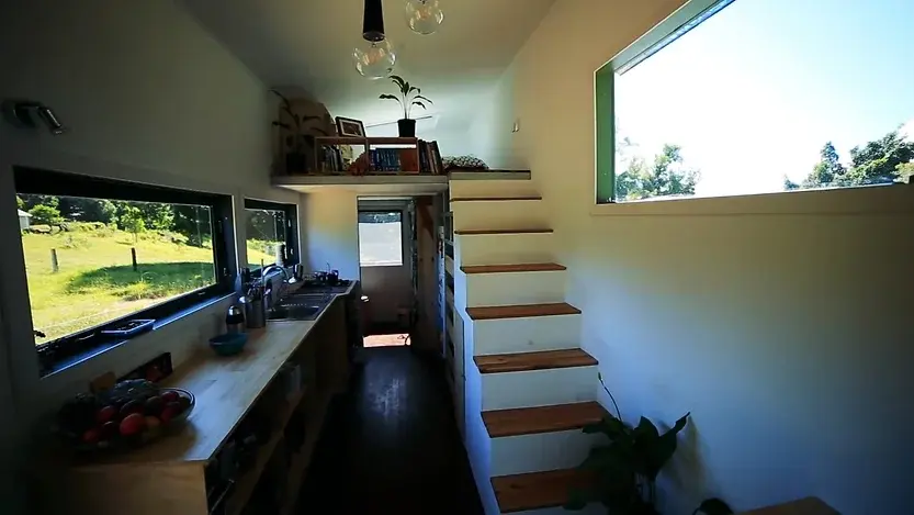 0321 Amazing tiny house with solar hot water solar electricity biogas and rainwater collection smallhometours.com 9