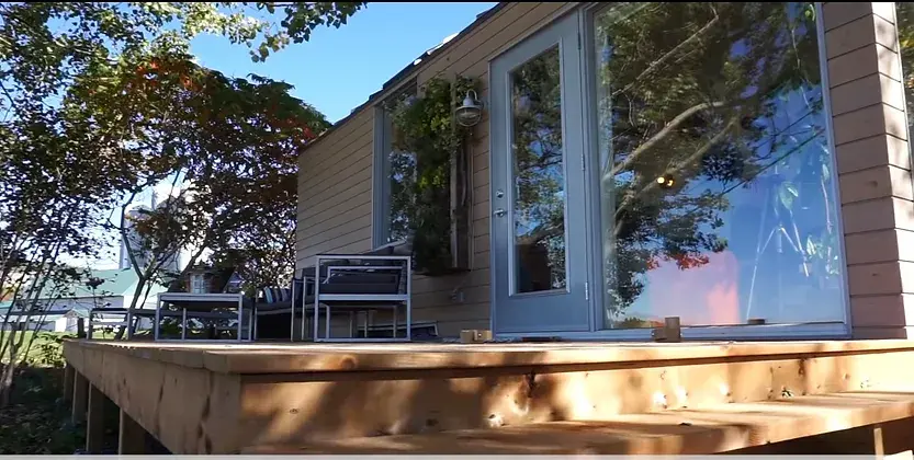 0327 210 sqft tiny house with space saving hidden bathroom smallhometours.com 5