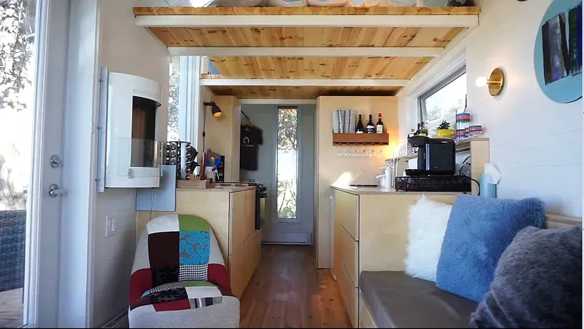 0327 210 sqft tiny house with space saving hidden bathroom smallhometours.com 6