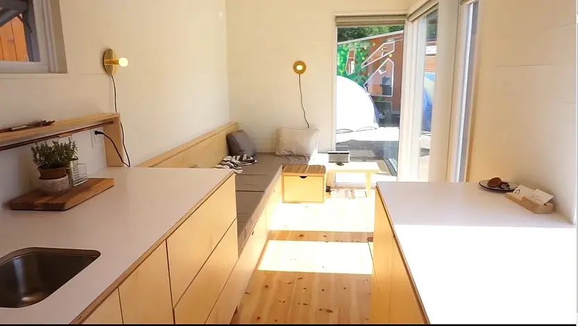 0327 210 sqft tiny house with space saving hidden bathroom smallhometours.com 8
