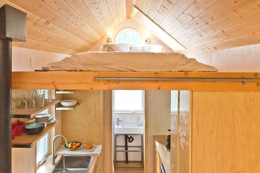 0329 Home office using 2 tiny houses in L deck smallhometours.com 1