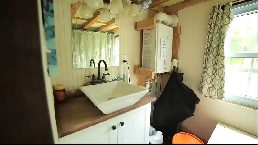 0331 DIY tiny house with permaculture village by a single mom smallhometours.com 1