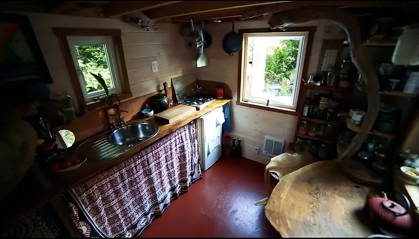 0335 Incredible tiny house build with abundance of driftwood powered bicycle generator smallhometours.com 2