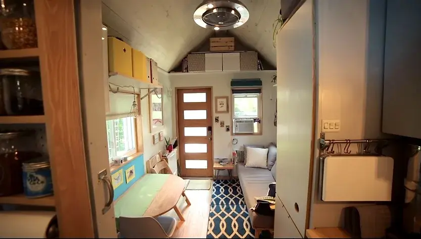 0337 Charming 18 tiny house on wheels a creative outlet to bring people together smallhometours.com 1