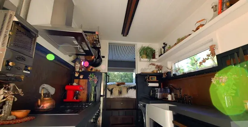0340 Couple build luxury tiny house with a huge dining table up for 12 people smallhometours.com 4