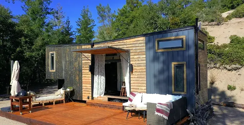 0340 Couple build luxury tiny house with a huge dining table up for 12 people smallhometours.com 7