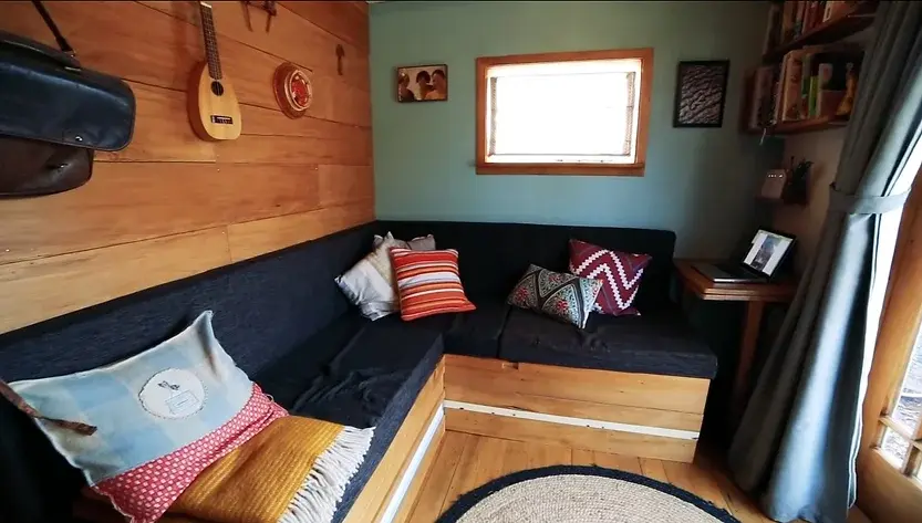 0342 Young woman build beautiful recycled tiny house from earthquake damaged homes for US19000 smallhometours.com 2
