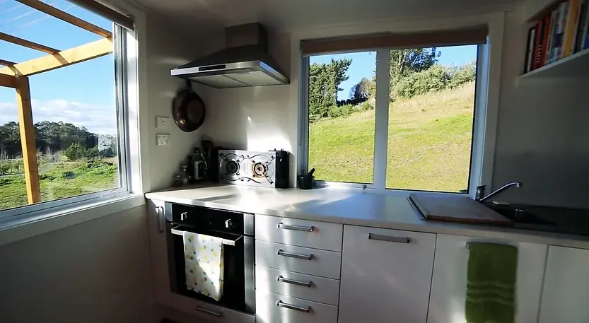 0345 Unique 23F tiny house with 9 windows climbing wall smallhometours.com 1