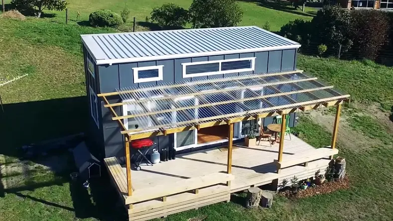 0345 Unique 23F tiny house with 9 windows climbing wall smallhometours.com 6